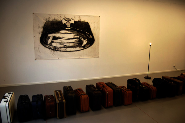 Exile V - (digital print,suitcases, ligth, languages and voices) - Oskarshamns Konsthall, Sweden, 2011